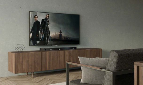 Sony tv and soundbar in a simple room