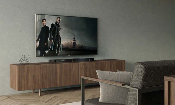 Sony tv and soundbar in a simple room 