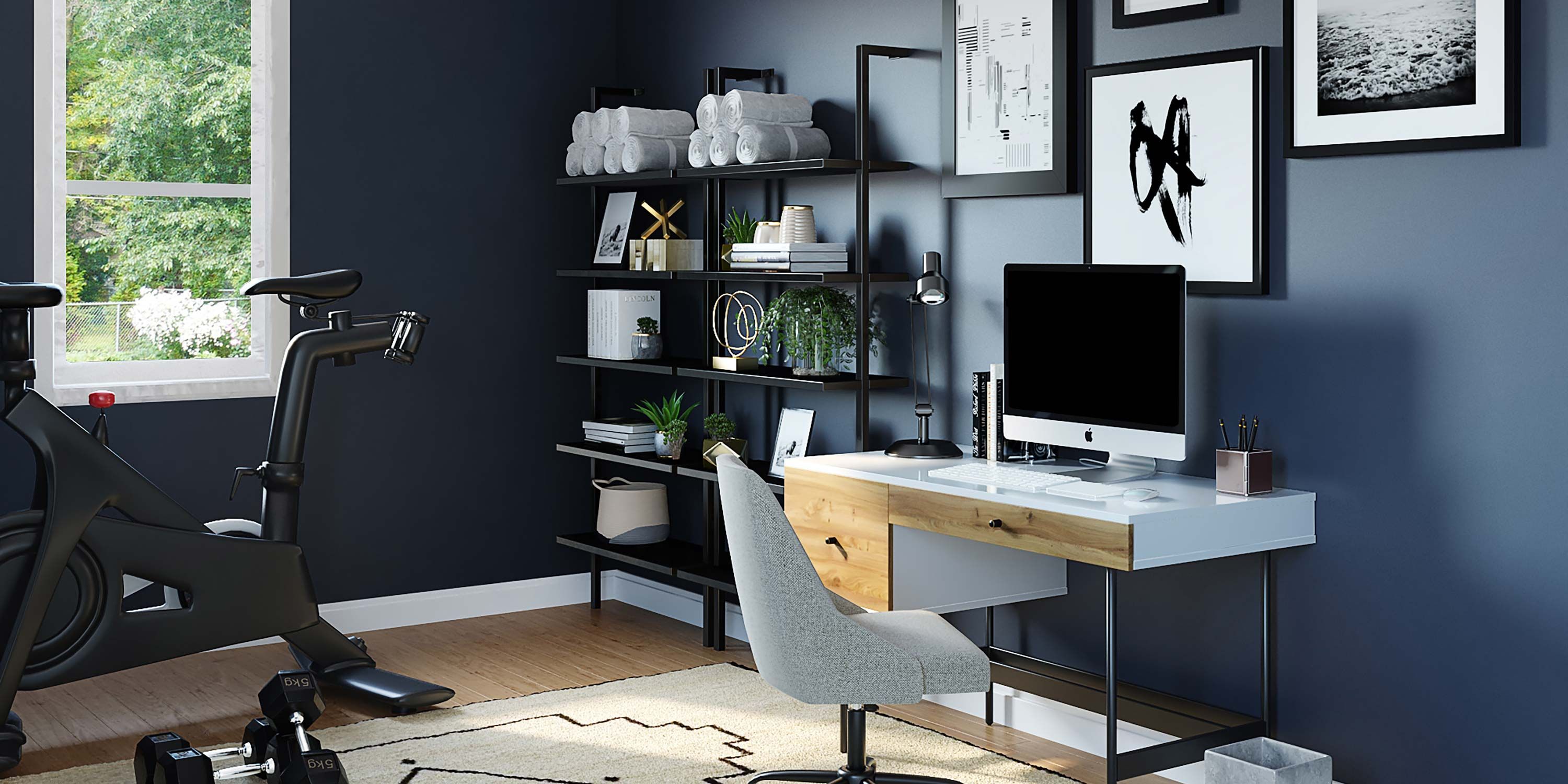 home office with blue walls and a mac computer on a white desk