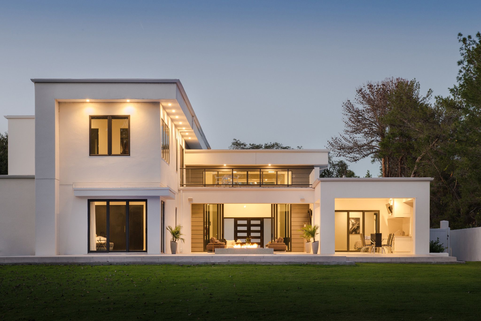 house exterior modern lutron lighting at dusk