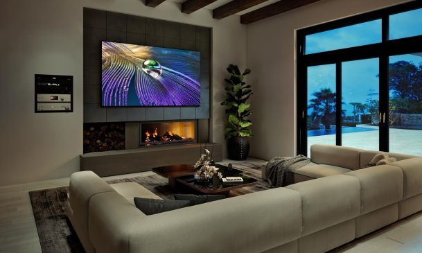 sony wall mounted tv in a modern living room at dusk